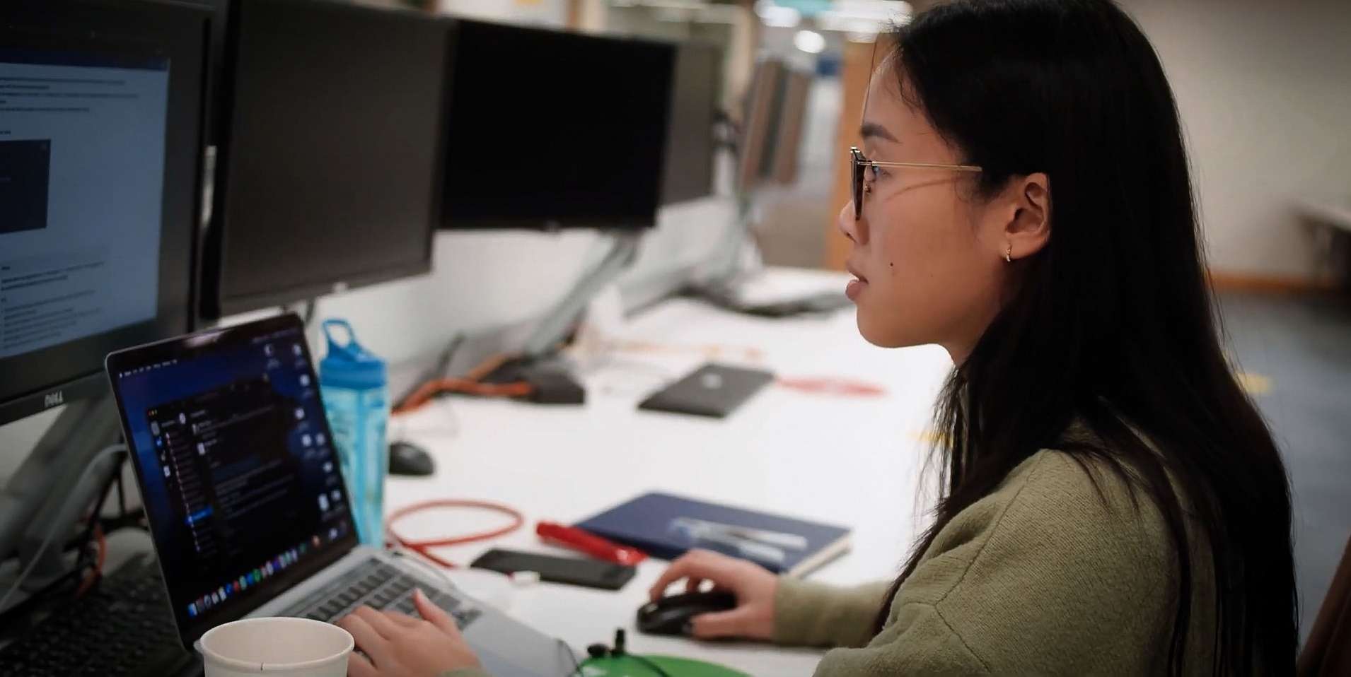 Researcher looking at computer