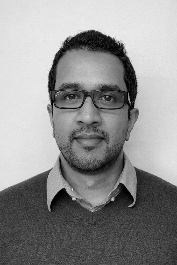 Black and white portrait of Keith Gomes Pinto