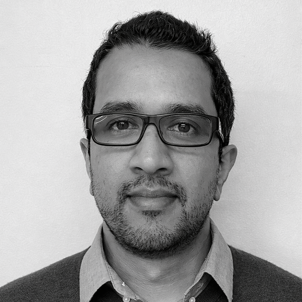 Black and white portrait of Keith Gomes Pinto